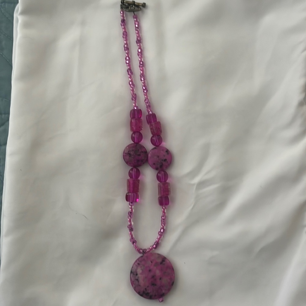 Hot pink beaded necklace and matching earrings